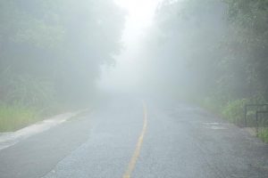 Old Rough Foggy Road - Photo: © Copyright Thassanee Suchada/Shutterstock