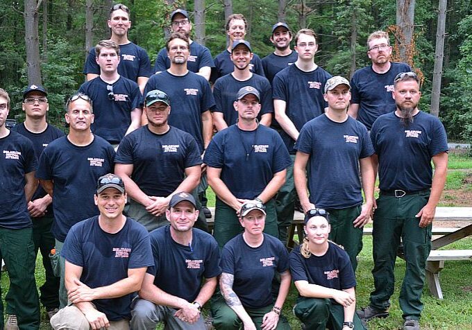 DELAWARE WILDFIRE CREW PHOTO:
Front row: (from left) Samual Topper of Maryland, Adam Keever of Newark, Monica Testa of Newark, and Hannah Small of Dover. Second row: (from left) Paul Moser of Dover, Rocco Hladney of Middletown, Mark Kammer of Magnolia, Eddie Boyer of Ellendale, Erich Burkentine of Milton, Nathaniel Sommers of Smyrna, and Jeff Wilson of Clayton. Third row: (from left) Dan Mihok of Magnolia, Andrew Doug Rawling of Newark, Michael Martini of Townsend, Christopher Valenti of Dover, and Bill Seybold of Dover. Back row: (from left) Bart Wilson of Dover, Zach Brown of Harbeson, Dave Pro of Newark, and Ryan Krammes of Newark.