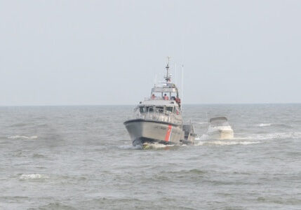 A Coast Guard Station Atlantic City, N.J., 47-foot Motor Lifeboat boat crew tows a boat Wednesday, Sept. 2, 2015. The boat was taking on water with inoperable bilge pumps near the Absecon Inlet following the 2015 Atlantic City Airshow. (U.S. Coast Guard photo by Chief Petty Officer Nick Ameen)