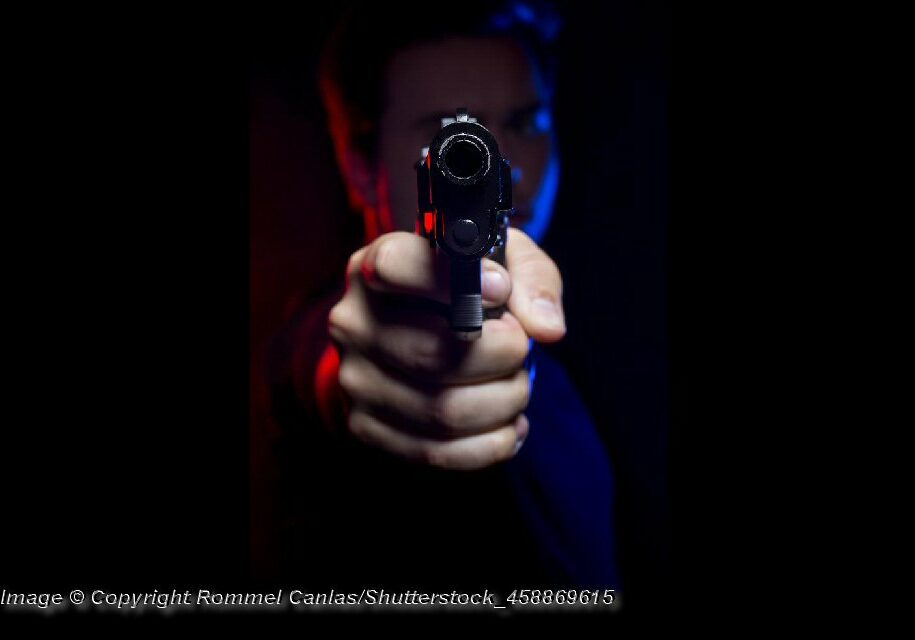 Gun Pointed at Viewer - PhoGun Pointed at Viewer - Photo: © Copyright Rommel Canlas/Shutterstockto: © Copyright Rommel Canlas/Shutterstock