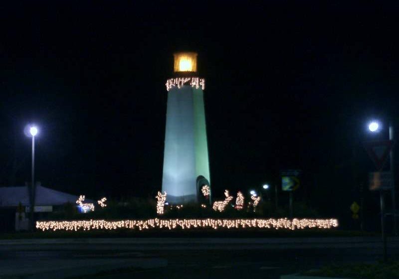 Chick Bradford - Christmas lights on the Rehoboth lighthouse in the roundabout - 2005