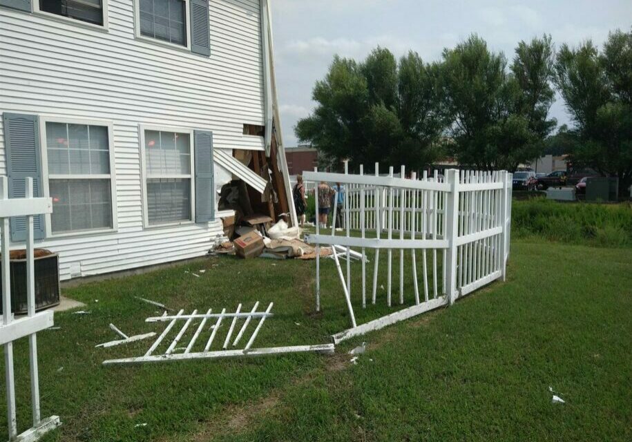 A car struck an apartment building in the Long Neck area Sunday.. Photo courtesy of the Indian River Volunteer Fire Company