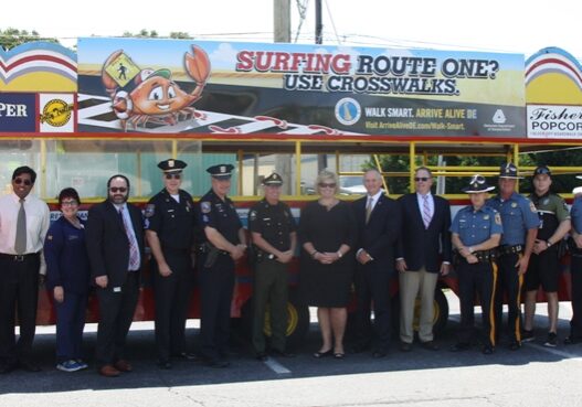 Officials are promoting pedestrian safety this month with a multi-pronged initiative which includes ads like this one on the Jolly Trolley. Image courtesy WGMD/Alan Henney